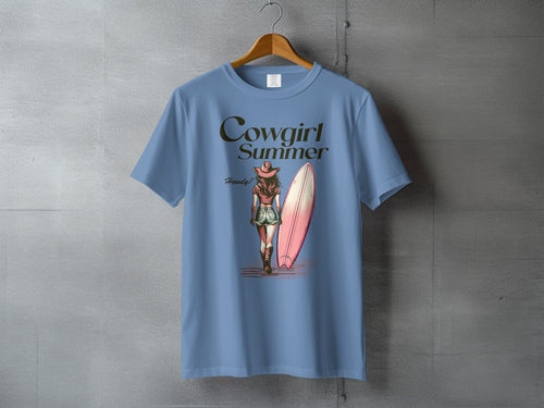 Cowgirl Summer graphic on blue t-shirt with surfboard and cowgirl.