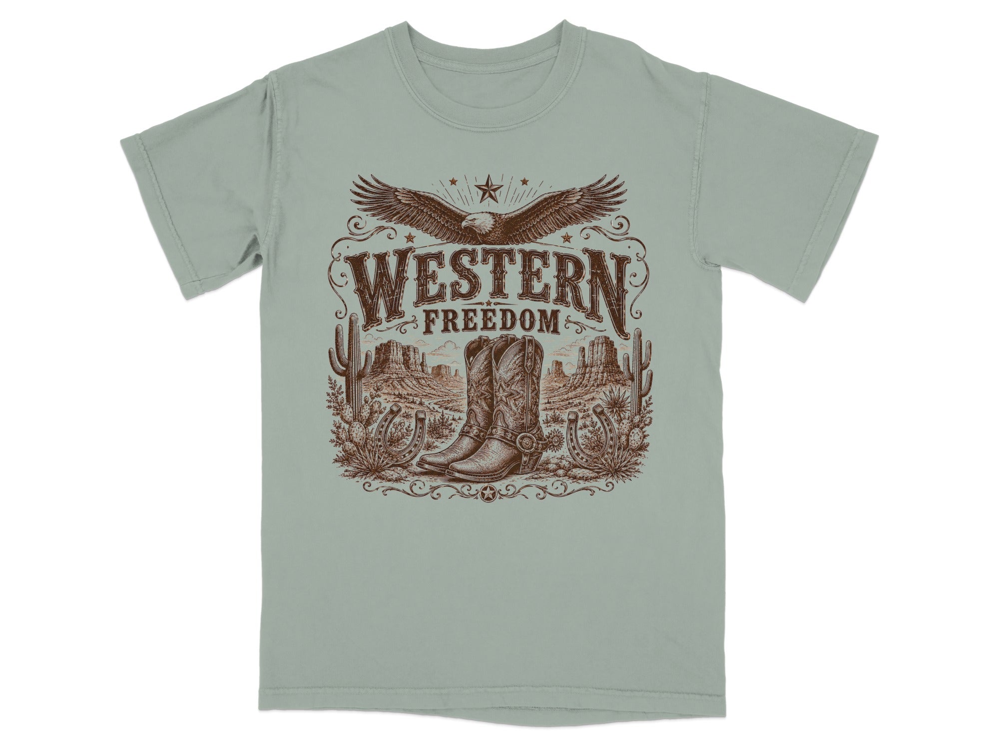 T-shirt with "Western Freedom" text, eagle, cowboy boots, cacti, and desert landscape.