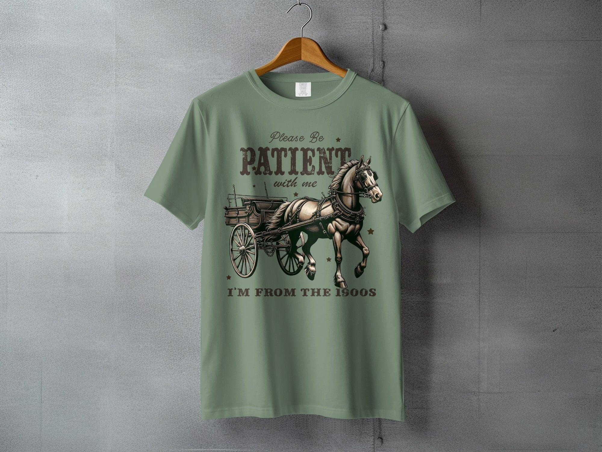 T-shirt with vintage horse and carriage graphic and text "Please be patient with me I'm from the 1900s."