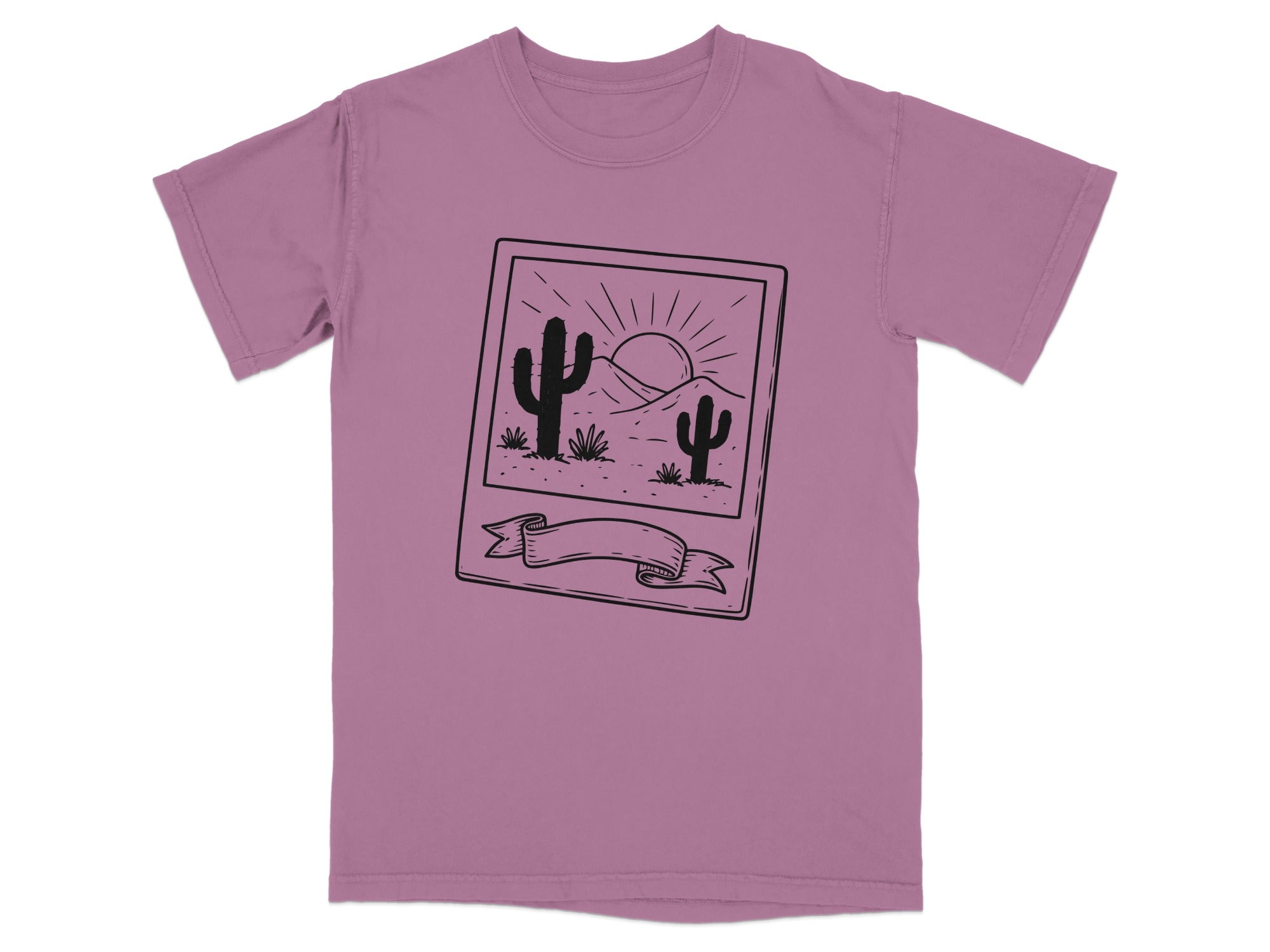 T-shirt featuring a black line drawing of a desert scene with cacti and a setting sun.