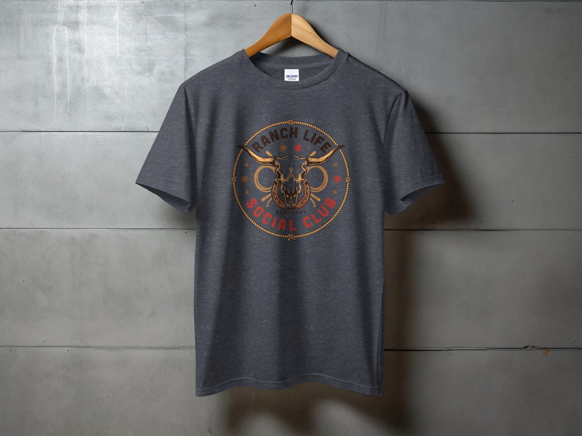 Dark grey t-shirt with a circular "Ranch Life Social Club" logo featuring bull horns.