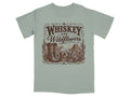 T-shirt with a "Whiskey and Wildflowers" desert scene and cowboy boots.