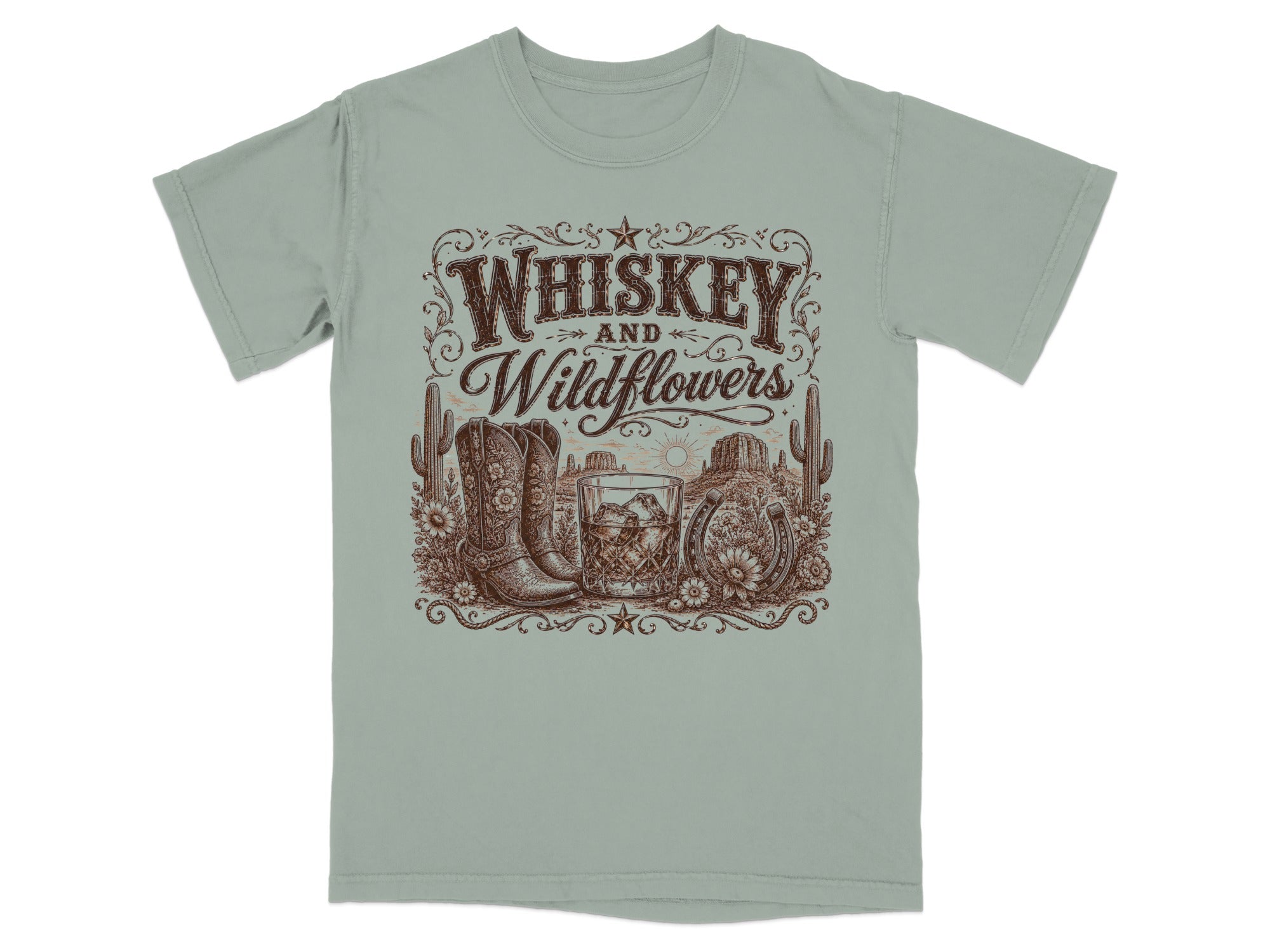 T-shirt with a "Whiskey and Wildflowers" desert scene and cowboy boots.