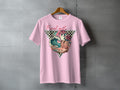 Pink t-shirt with "Feral girl Summer" graphic featuring cowboy boot, palm trees, and waves.