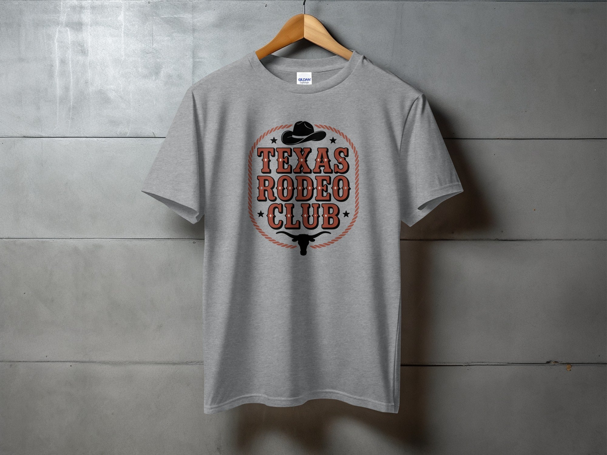 Gray t-shirt with "Texas Rodeo Club" text and bull horns graphic.