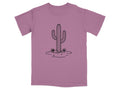 Purple t-shirt with a black line drawing of a saguaro cactus with rocks and grass.