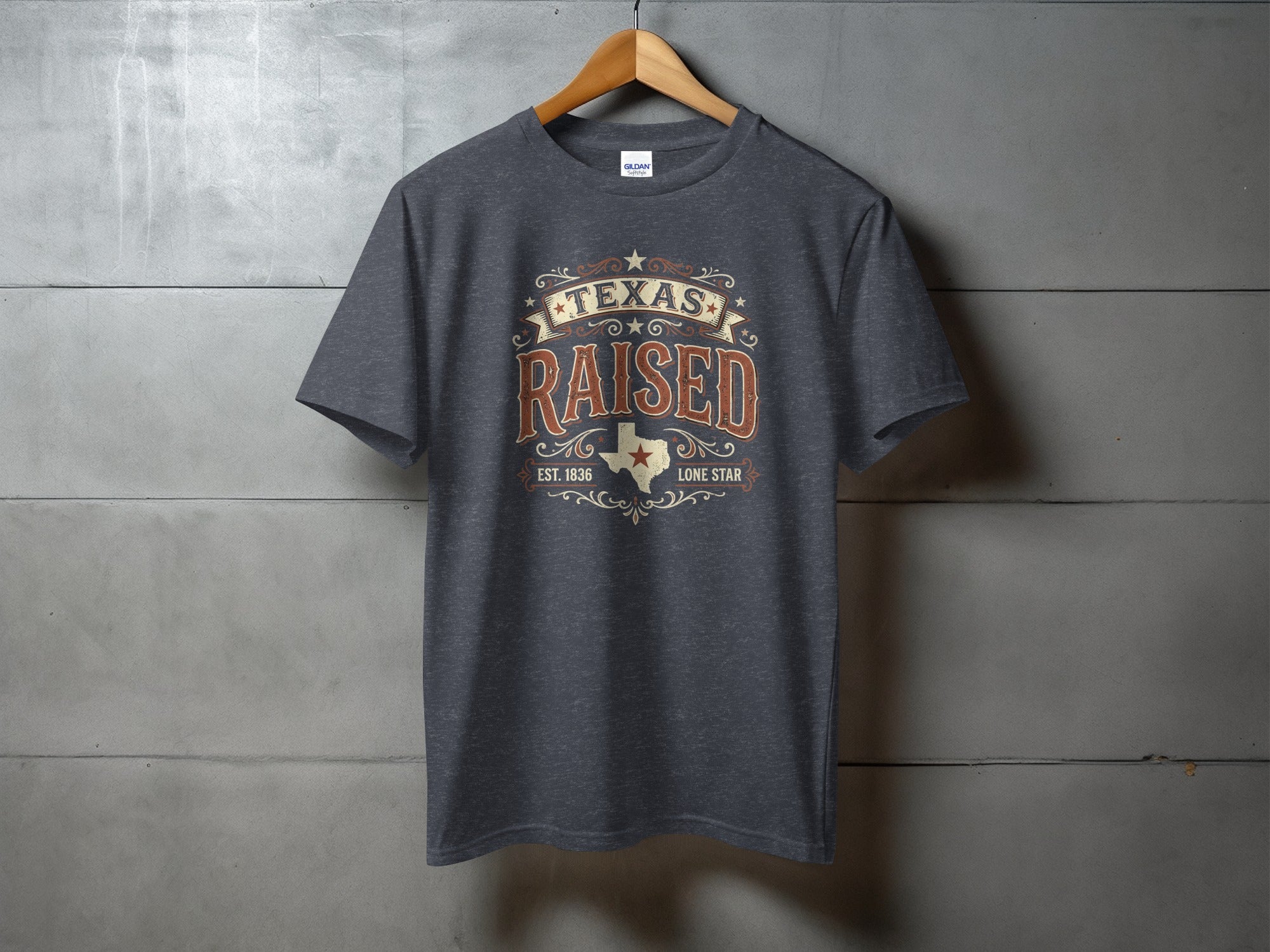 Dark grey t-shirt with "Texas Raised Est. 1836 Lone Star" text and a Texas outline.