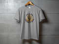 Grey t-shirt with circular Texas Desert Sun cactus graphic and sunset design.