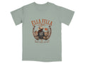 T-shirt graphic with a woman wearing a cowboy hat and denim jacket in a desert scene.