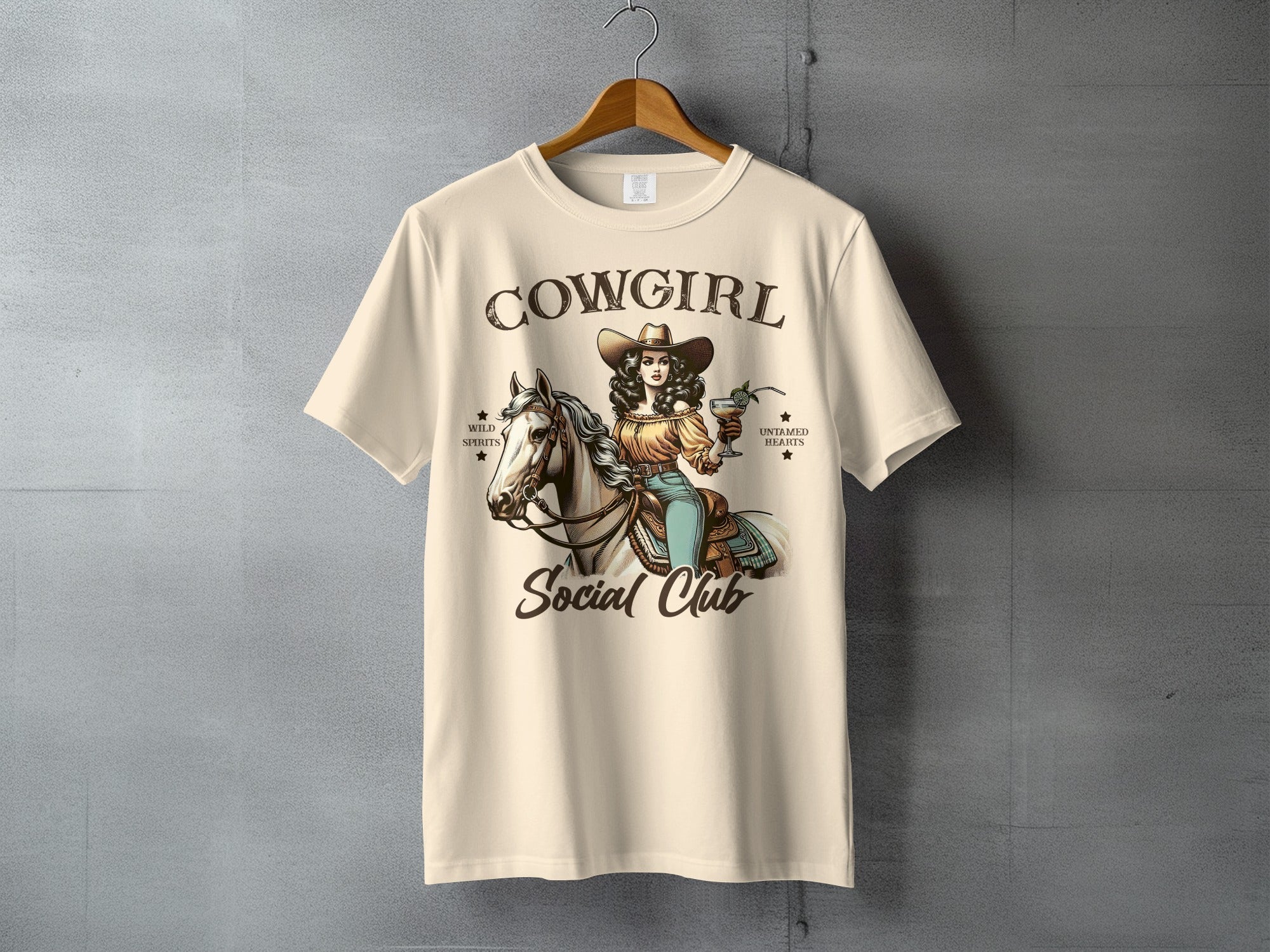 Cowgirl Social Club t-shirt with woman on horse holding drink.