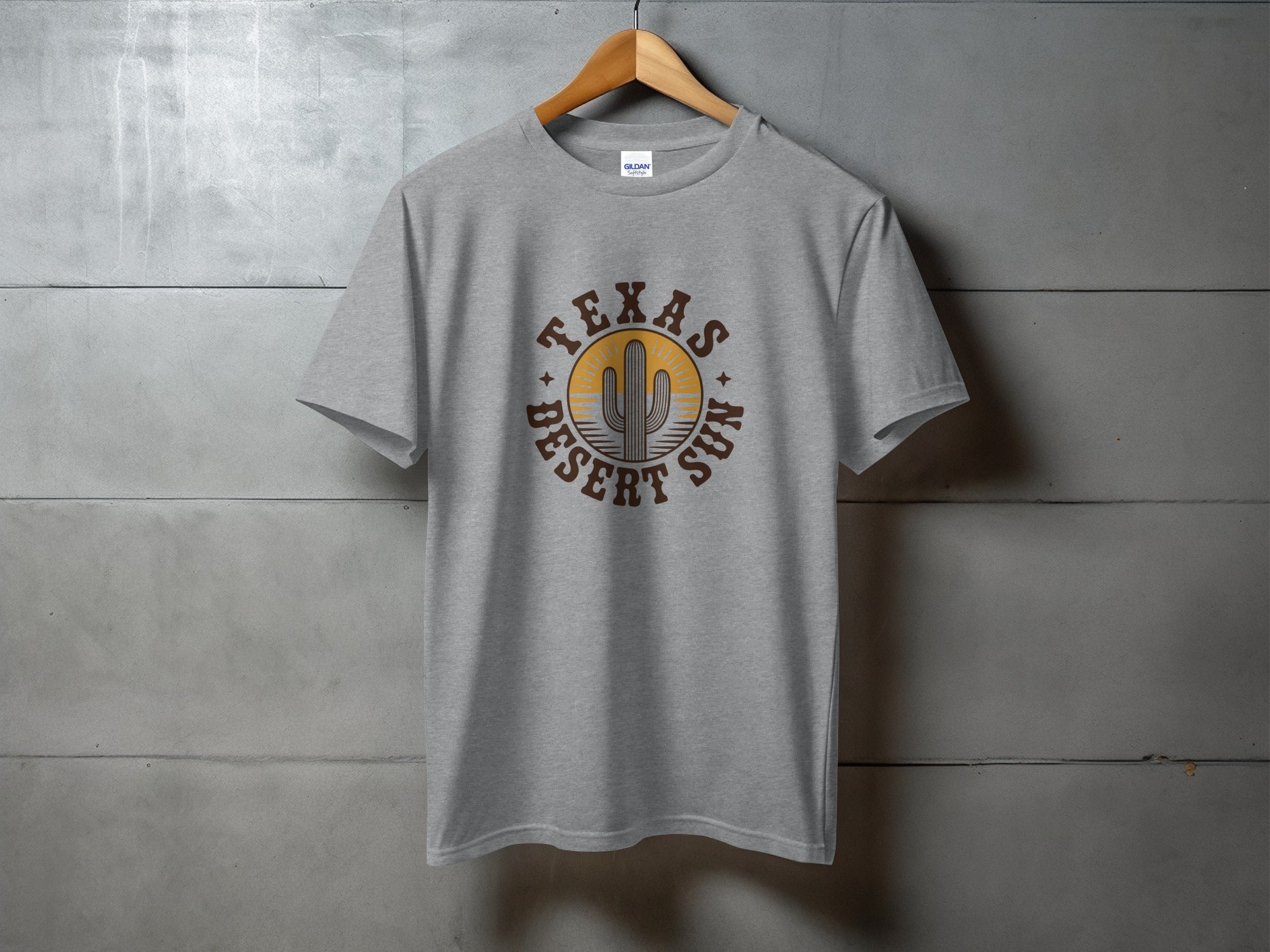 Grey t-shirt with "Texas Desert Sun" text and cactus graphic.