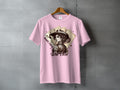 Pink t-shirt with a woman in a cowboy hat and playing cards graphic.