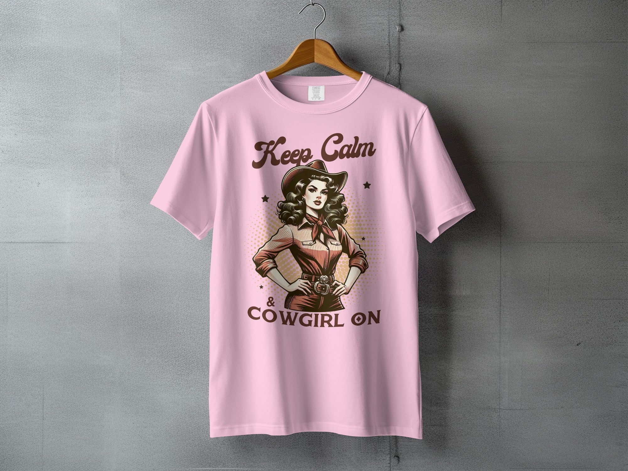 Pink t-shirt with "Keep Calm & Cowgirl On" text and a cowgirl illustration.