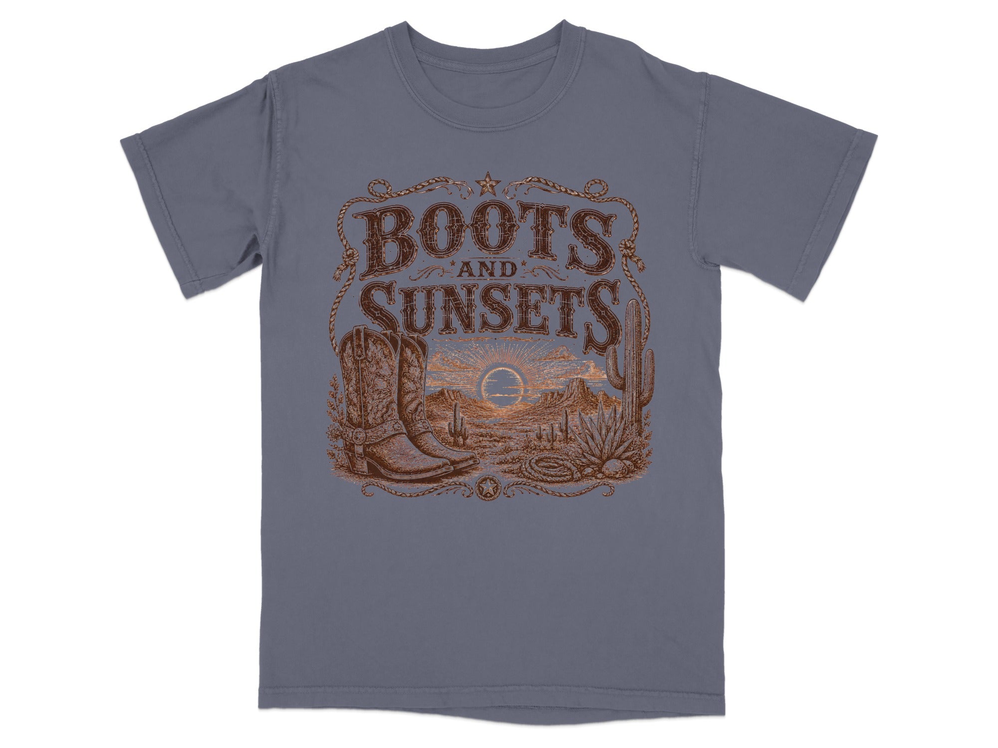 Grey t-shirt with "Boots and Sunsets" graphic, desert landscape, cowboy boot, and cactus.