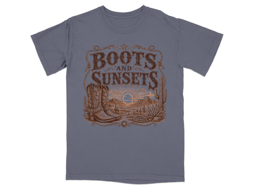 Grey t-shirt with "Boots and Sunsets" graphic, desert landscape, cowboy boot, and cactus.