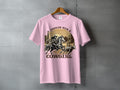 T-shirt graphic: cowgirl roping a bull in a desert landscape.