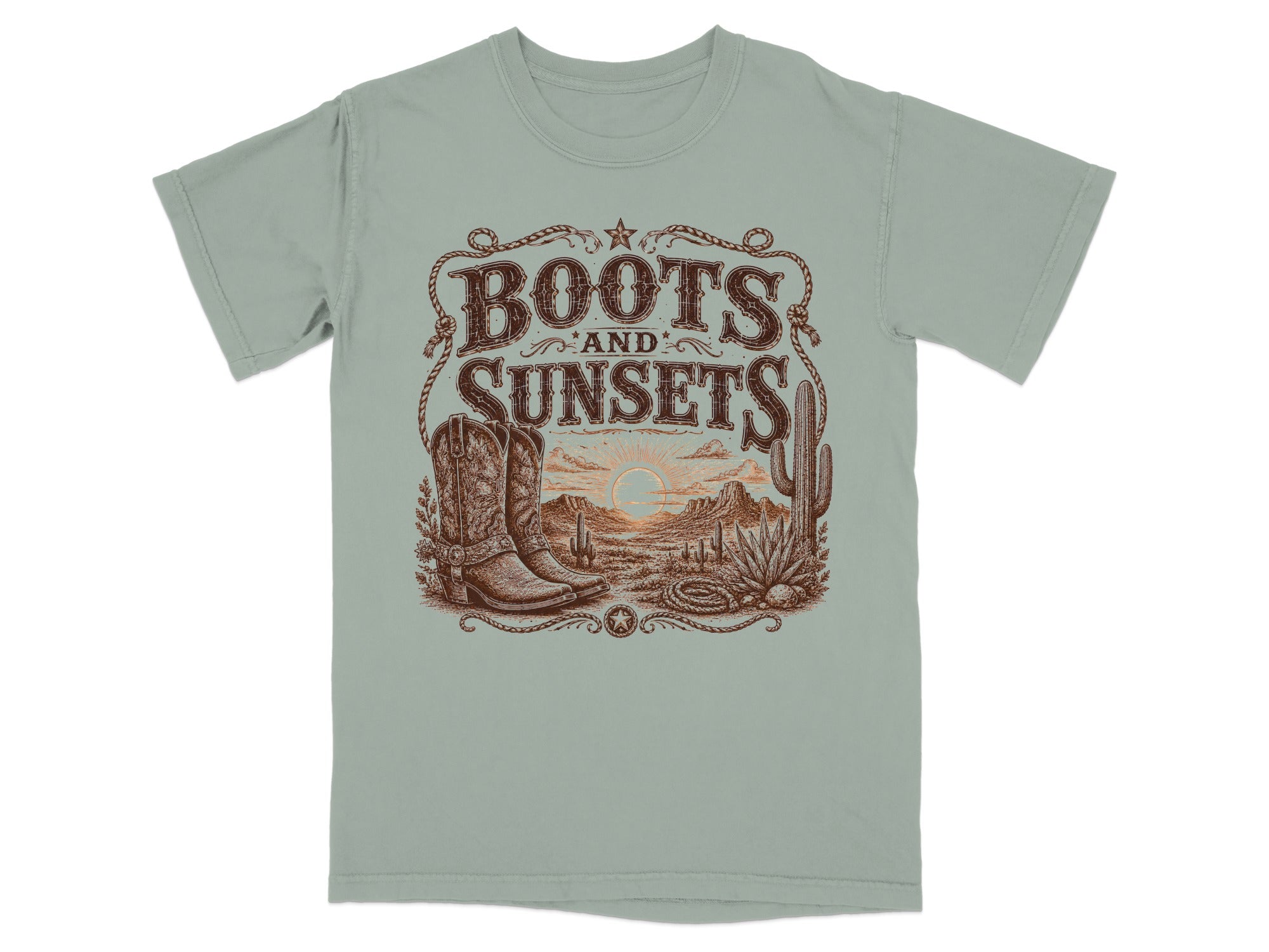 T-shirt graphic with vintage western scene, boots, cactus, and "Boots and Sunsets" text.