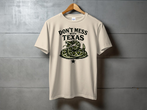 Cream t-shirt with "Don't Mess With Texas" text and coiled rattlesnake graphic.