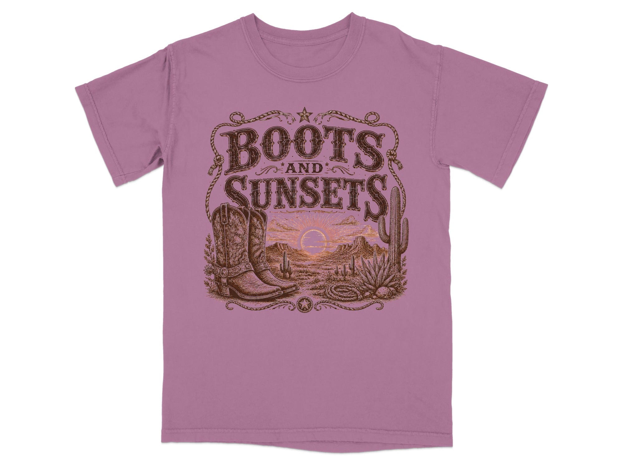 T-shirt with "Boots and Sunsets" text, cowboy boots, desert landscape, and cacti.