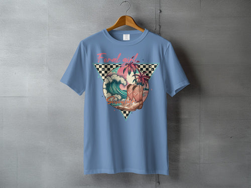 Blue t-shirt with a retro graphic of a cowboy boot, palm trees, and waves.