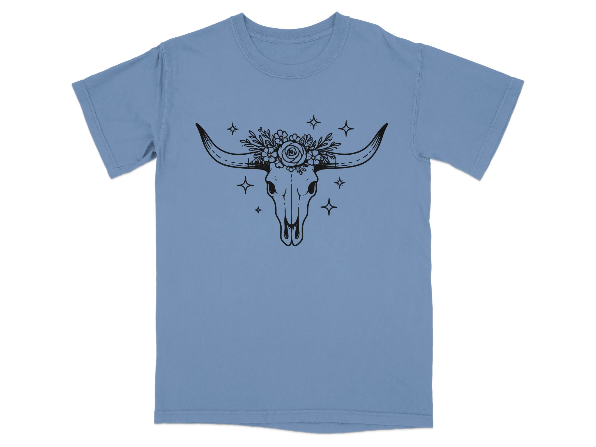 Bull skull with floral crown and stars on a blue t-shirt.