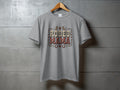 Grey t-shirt with "RODEO MAMA" text and cowboy boot and star graphics.