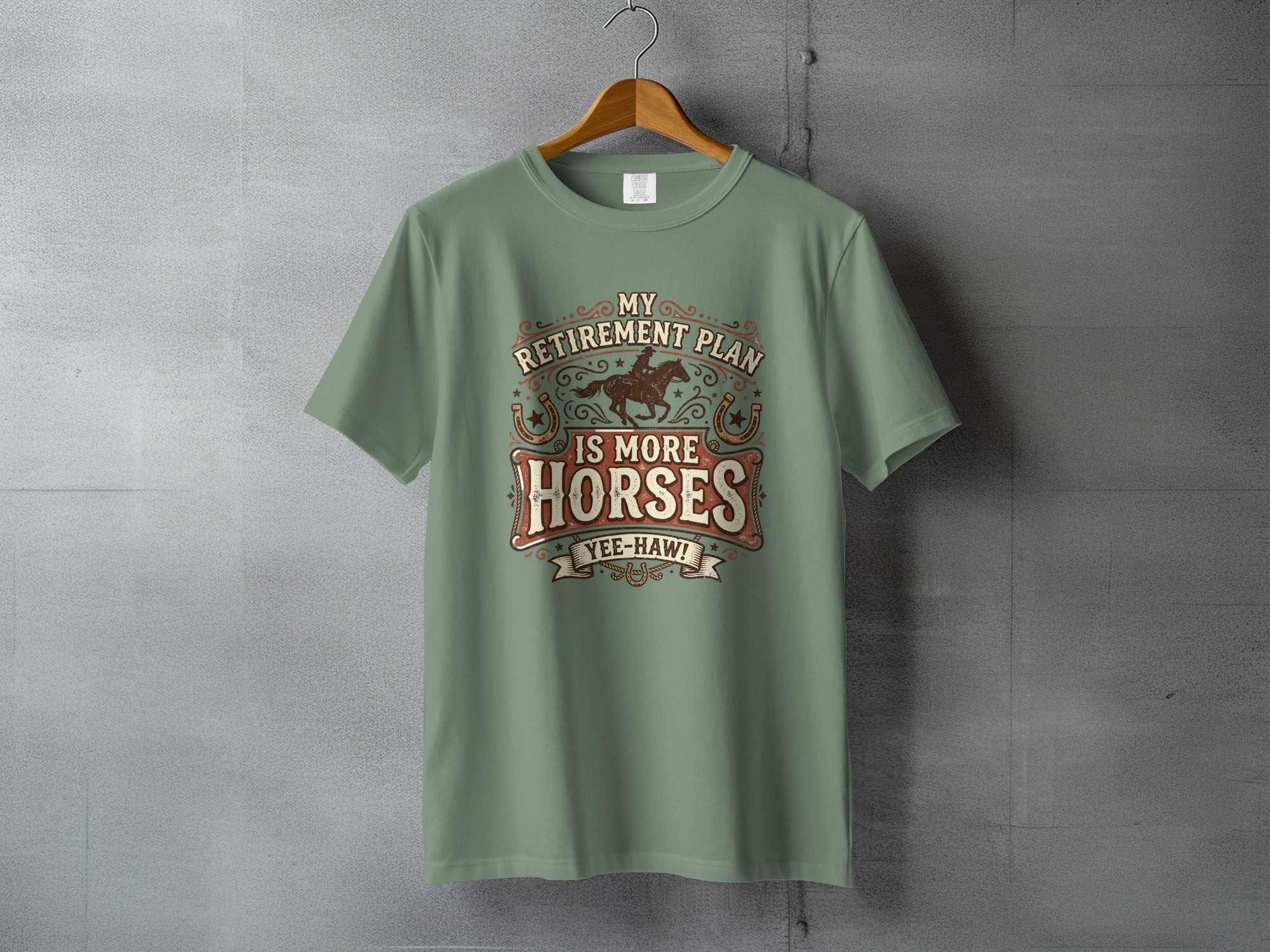 Green t-shirt with "My Retirement Plan is More Horses" graphic and a cowboy on a horse.