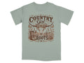 T-shirt with "Country Girl Roots" graphic featuring a steer skull, boots, and desert flora.