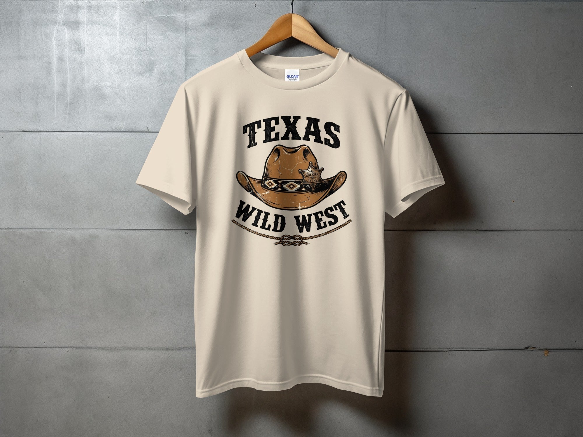 Cream t-shirt featuring a Texas Wild West graphic with a cowboy hat and sheriff badge.